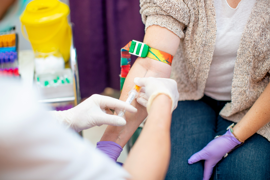 female hormone blood test needle in arm