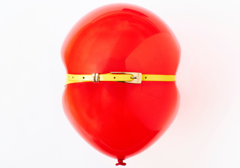 Bloating red balloon that is full